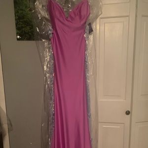 Check out this brand new with tags beautiful lilac prom dress.